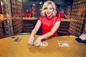 TAYA777 live casino studio with multiple cameras capturing roulette and blackjack tables